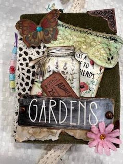 This little handmade garden journal is a nice size and fits in your hands.  It is full of pages to journal your gardening thoughts or hints.  It has 100 pages plus a small take out journal with 30 more pages to journal on.  There are also lots of pockets and tuck spots with tags and spots to write on. The corners of the cover have decorative metal corner protectors. It measures approximately: 6" X 4 1/2" The spine is 1 1/2" Junk Journal Pockets, Garden Junk Journal, Journal Pockets, Garden Junk, Garden Journal, Small Notebook, Corner Protectors, Vintage Junk, Vintage Junk Journal