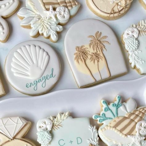 Kerstyn Lott on Instagram: "She said yes  Such a dreamy theme I loved working on this set. Net inspo is from The Millers Wife.   #beachcookies #beachproposal #beachlife #summervibes #engagementcookies #shesaidyes #beachwedding #beachweddingcookies #seashellcookies #cookieart #cookieartist #cookiedecorating #decoratedcookies #cookiedesign #designercookies #cookieoftheday #instacookies #dallascookies #friscocookies #confettiyeticookies" Seashell Cookies, Engagement Cookies, Bridal Cookies, The Millers, Beach Cookies, Decorative Cookies, Beach Proposal, Tree Cookies, Beach Bachelorette