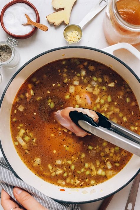 Using tongs to add boneless skinless chicken thighs to broth Roasted Boneless Chicken Thighs, Pre Cooked Chicken, Boneless Skinless Chicken Thighs, Quick Chicken, Noodle Soup Recipes, Soup Recipes Chicken Noodle, Boneless Chicken Thighs, Skinless Chicken Thighs, Arugula Salad