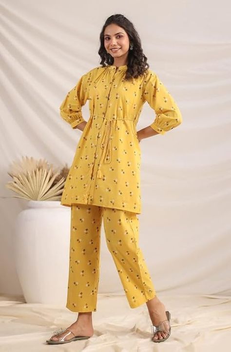 Embrace vibrant elegance with the Janasya Women's mustard cotton cambric co-ord set. Crafted from pure and breathable cotton, this set features a bright geometric print top in gathered style and band collar, and cuff s;leevs that create a playful and feminine look adding a button placket and drawstring tie-up on waist, the fit add a touch of modernity, making it a perfect choice for casual occasions Bandhani Pattern, Cord Set, Stylish Top, Band Collar, Co Ord Set, Feminine Look, Two Piece Dress, Outfit Set, Co Ord