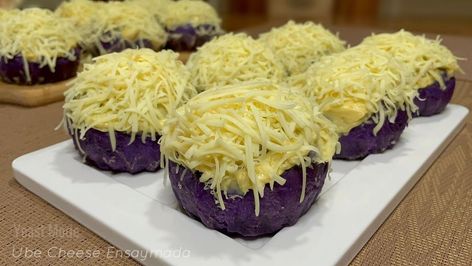 Soft Ube Cheese Ensaymada Recipe | UBE CHEESE ENSAYMADA ✔️Dough 3 tbsp sugar [38 grams] 2 tsp instant dry yeast [6 grams 1 whole large egg [60 grams] 1 cup fresh milk (lukewarm) [240 ml] 1... | By Yeast Mode Cheese Pandesal Recipe, Ensaymada Recipe, Pandesal Recipe, Ube Recipes, Philippines Recipes, Cheese Bread Recipe, Homemade Cookbook, Purple Yam, Filipino Desserts