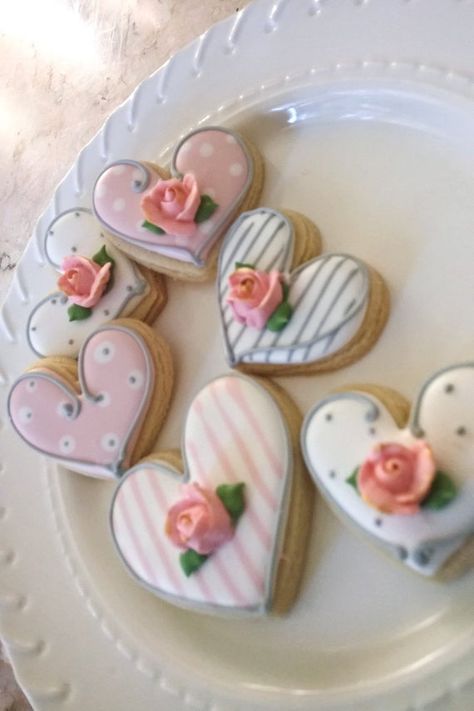 A dozen of Shabby ChicTheme Heart Cookies with Rosebud accent. They will be individually wrapped in self-sealing cellophane. Mini cookies in the photos are not included. Theyre only for size reference. Since these cookies are handmade individually, please note that there will be some slight Airbrushing Cookies, Button Cupcakes, Heart Sugar Cookies, Floral Cookies, Valentine Cookies Decorated, Cookies Cupcake, Lamb Cake, Fairy Heart, Valentines Cookies