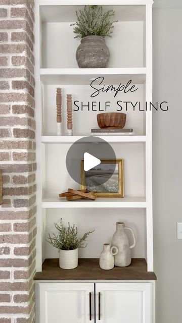 Katie Sharpe | DIY Tutorials | Home Decor | Interior Design on Instagram: "Shelf Styling  Do you like to style shelves or do you find it overwhelming?   Some simple rules I follow when styling shelves:  -Group items of differing heights -Use decor with varying textures and shapes -If using books, display them both vertically & horizontally  -Add plants for a natural element  -Frame printable art (it can be easily changed for the seasons)  -Use complimentary colors for a cohesive look -When decorating multiple shelves in one space, arrange items in groupings to visually create a triangle   SAVE this for the next time you style shelves!   Comment SHOP to get links sent directly to you (Some items are exact, most are similar.  If you want to know where I got something that isn’t linked feel f Simple Shelf Decor, How To Style Shelves Living Room, How To Decorate Shelves In Living Room, Contemporary Shelving, Tall Shelves, Styling Shelves, Simple Rules, Complimentary Colors, Shelf Styling