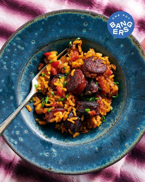 Baked Spanish Rice Recipe with Chorizo, Chickpeas, and Raisins | Saveur Baked Spanish Rice, Recipe With Chorizo, Chorizo Rice, Spanish Rice Recipe, Chorizo Recipes, Baked Rice, Spanish Rice, Most Popular Recipes, Canned Chickpeas