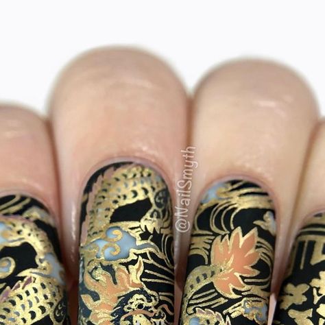 Marilynn on Instagram: "Hi! I’m joining a group of nail friends in wishing a happy birthday to the incredibly talented @fificrossnails 🥳  We’re celebrating Fiona today with a theme of black and gold patterns. I was inspired by a gorgeous antique Japanese teacup set I have with a black and gold dragon print… these were fun to stamp! I added in a couple details on the dragon by hand, too. For the clouds I used a sheer white polish for a smokey effect.  Hope you have a super special day, Fiona! Many thanks to our lovely hosts, and the rest of the gorgeous manis can be seen under #FionaIsFiftyandFabulous 🎉  .🐉Products used🐉 Orly “Liquid Vinyl” Cuticula “Coconut Milk Sorbet” What’s Up Nails stamping polish “Go for Gild” Maniology plate M460 What’s Up Nails Magnified Clear Stamper OPI Matte Teacup Nails, Black And Gold Dragon, Japanese Teacup, Dragon Nails, Up Nails, Teacup Set, White Polish, Gold Dragon, Dragon Print