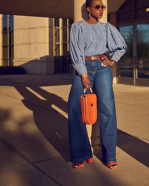 Farotelle wearing Gap blue wide-leg jeans with blue balloon sleeve blouse, Schutz Ully orange strappy sandals and Tomoli Fitini orange bag as Spring Summer elevated casual denim outfit. Summer Denim Jeans With Belt Loops, Spring Streetwear Jeans With Belt Loops, Chic Denim Blue Flare Jeans With Belt Loops, Spring Short-leg Jeans With Belt Loops, Flowy Dresses Casual, Chic Wide-leg Jeans With Belt Loops, Neutral Jeans, Casual Denim Outfits, Jeans Outfit Ideas