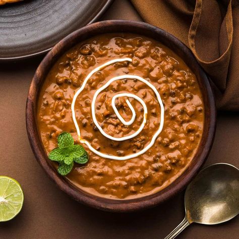 Just like we owe the butter chicken to Kundan Lal Gujral, we owe the dal makhani to him too. The inventor of both these popular dishes of North Indian cuisine today, worked at a dhaba in Peshawar. Once the owner's health did not keep up, he sold it off to him and Kundan Lal renamed it as Moti Mahal. The well-established chain that you see today was brought by Gujral post Partition when he moved to Delhi. Black urad dal became a game changer at his restaurant when he dunked in it a tomato and oni Dal Makhani Recipe, Dal Makhani, Popular Dishes, Urad Dal, Chutney Recipes, Garlic Paste, Cooking Skills, Butter Chicken, Pressure Cooking