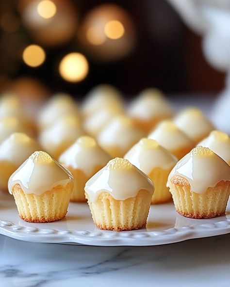 Mini Lemon Pound Cake Bites Recipe Ingredients For the Lemon Pound Cake Bites: 1/2 cup unsalted butter, softened 4 oz cream cheese, softened 1 cup granulated sugar 2 large eggs, room temperature 1 tbsp lemon zest (from about 1 large lemon) 1 tbsp fresh lemon juice 1 tsp vanilla extract 1 1/4 cups all-purpose flour 1/2 tsp baking powder 1/4 tsp salt For the Lemon Glaze: 1 cup powdered sugar 2–3 tbsp fresh lemon juice 1 tsp lemon zest Optional: festive sprinkles for garnish Instructions Pre... Mini Lemon Pound Cake, Pound Cake Bites, Mini Lemon Cakes, Cake Bites Recipe, Cake Bites, Lemon Glaze, Lemon Pound Cake, Recipe Ingredients, Lemon Cake