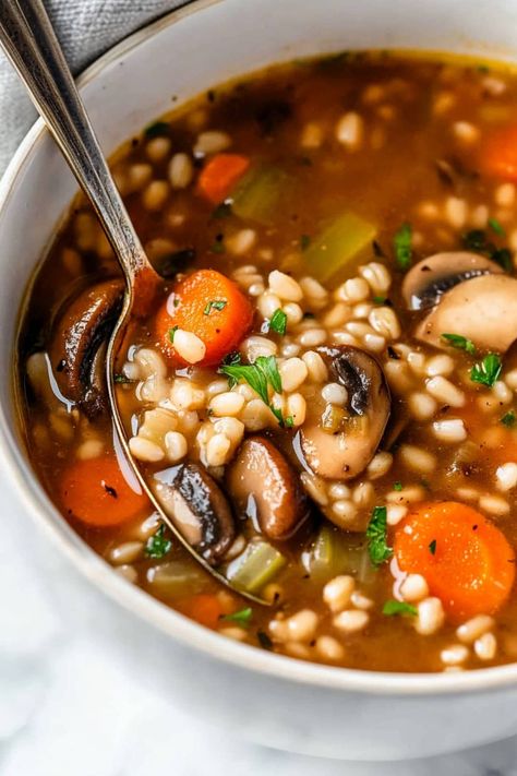 This classic mushroom barley soup is savory, earthy, and guaranteed to satisfy! It's a comforting meal the family will love. Mushroom And Bean Soup, Instant Pot Mushroom Barley Soup, Mushroom And Barley Soup, Mushroom Barley Soup Recipe, Barley Vegetable Soup, Crockpot Mushrooms, Barley Soup Recipe, Mushroom Barley, Mushroom Barley Soup