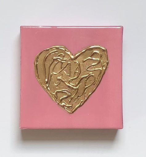 "This hand-painted blush pink small canvas with gold painted heart makes a great addition to any room! The textured gold heart and shiny resin gloss coat make this artwork pop! This adorable canvas is a wonderful gift idea for an anniversary, Valentines, Mother's Day, little girls nursery wall art. Treat your friend, bridesmaids, sister or niece to this unique piece of art! All items in my store or customizable. Let me know if you would like a different color background, size, or image and I wil Heart Canvas Painting, Celtic Wall Art, Heart Art Projects, Heart Canvas Art, Hand Painted Crosses, Bunny Wall Art, Heart Artwork, Nursery Wall Art Girl, Bunny Painting