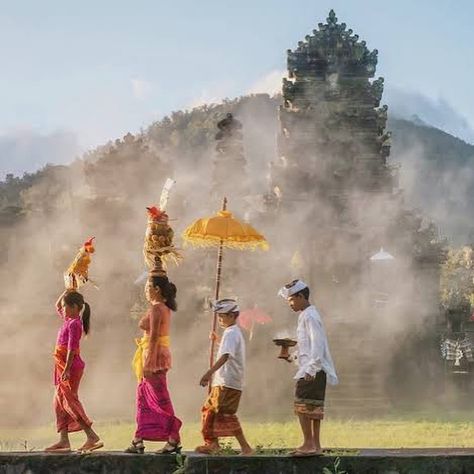 We love the rich culture of Bali. March is a special month for the Balinese, full of holidays and ceremonies.  The holidays include: Galungan is the Balinese holiday celebrating the victory of good over evil. It marks the time when the Balinese believes their ancestors spirits visit the Earth. During this time, penjors the tall curved bamboo poles with offerings at the end, are installed on the sides of the road. The elaborately decorated poles are massive and majestic. It’s my favorite sea... Nyepi Day, Bali Girls, Silent Day, What Should I Draw, Good Over Evil, Bamboo Poles, Celebration Around The World, Bali Island, Silk Jewelry