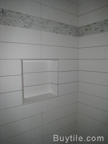 4x18 tile  long rectangle... Thinking this for my bathroom with matching grout... like this size tiles with mosaic Brick Pattern Tile, Large Shower Tile, Ceramic Tile Floor Bathroom, White Subway Tile Bathroom, Subway Tile Patterns, Patterned Bathroom Tiles, Subway Tile Showers, Tile Floor Living Room, Subway Tiles Bathroom