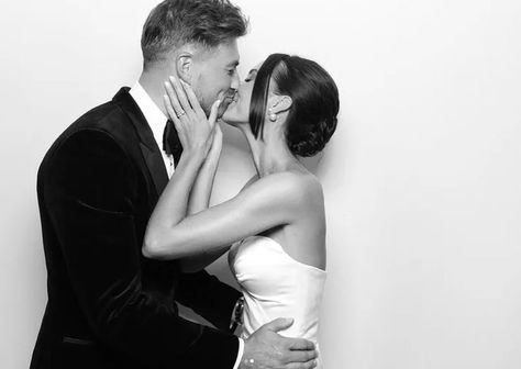 Photo of bride and groom kissing. Bride is holding the grooms face. Image is black and white from viva la booth photobooth hire Photo Booth Wedding Black And White, Photo Booth Black And White, Black And White Photobooth Pictures, Luxury Photobooth, Reception Portraits, Black And White Photo Booth, Photobooth Poses, Wedding Packages Prices, Leather Guest Book