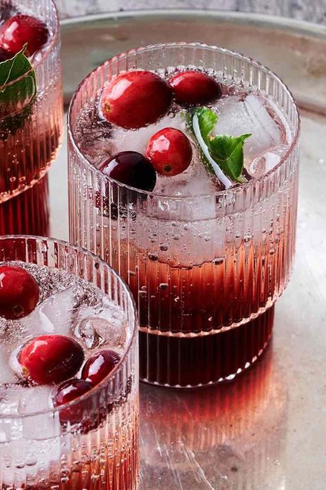 This cranberry shrub is a sweet-tart mix of fruit, sugar, and vinegar that makes a syrup-like base to dilute with seltzer. It can be made up to a month ahead. #easylunchrecipes #familydinner #familyfriendlyrecipes #marthastewart #recipeideas #recipes #weeknightdinners Cranberry Shrub, Shrub Drink, Fresh Cranberry Recipes, Shrub Recipe, Fruit Sugar, Cranberry Recipes, Fresh Cranberries, Sweet Tarts, Breakfast Brunch Recipes