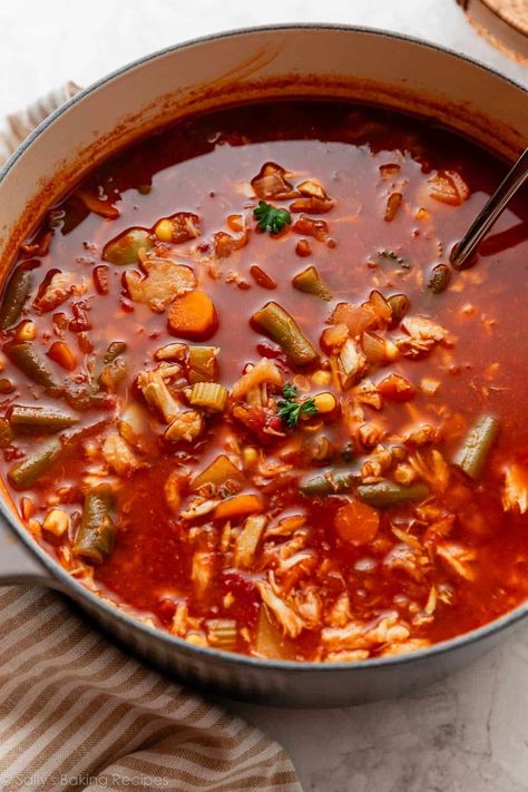 A tomato- and broth-based soup full of healthy vegetables and the delicate flavor and texture of lump blue crab, Maryland crab soup is a local staple that deserves to be shared far and wide. This is a generously seasoned family favorite, and welcomes many substitutions based on what you have on hand. Recipe on sallysbakingaddiction.com Crab Vegetable Soup, Md Crab Soup Recipe, Crab Claw Recipes, Maryland Crab Soup, Crab Soup Recipes, Canned Crab Meat, She Crab Soup, Indian Soup, Slow Cooker Chicken Chili