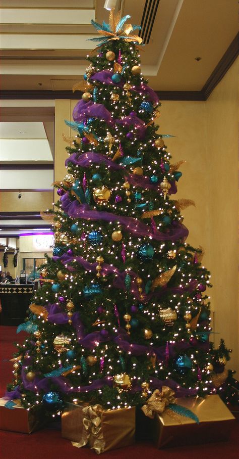 Purple & Gold16ft Decorated ChristmasTree | by Christmas Specialists Purple Christmas Tree, Peacock Christmas, Gold Decorations, Christmas Tree Inspiration, Purple Christmas, Cool Christmas Trees, Gold Christmas Tree, Christmas Tree Ideas, Beautiful Christmas Trees