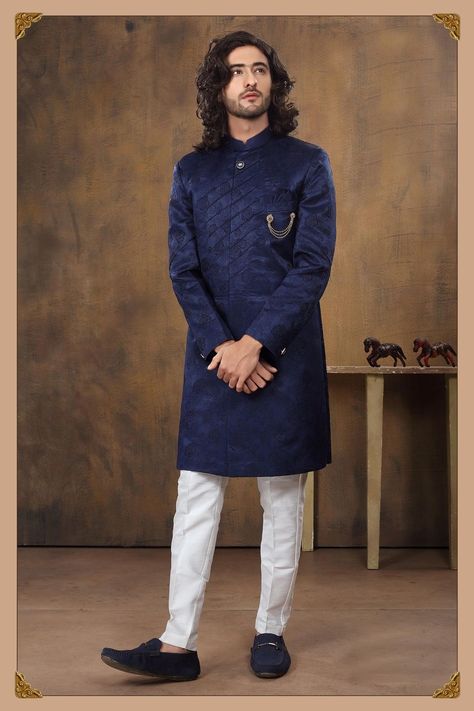 Buy Imported Fabric Floral Print Indo Western Online from Bodylinestore at best price. Select wide range of men's wedding sherwani, designer Sherwani for groom, traditional sherwani, jodhpuri Sherwani, sangeet sherwani and more. #ImportedFabricFloralPrintIndoWestern #BuyImportedFabricFloralPrintIndoWesternOnline Achkan For Men, Tuxedo Suit For Men, Men Sherwani, Designer Tuxedo, Velvet Pant, Western Outfits Men, Mens Sherwani, Modest Evening Dress, Sherwani For Men