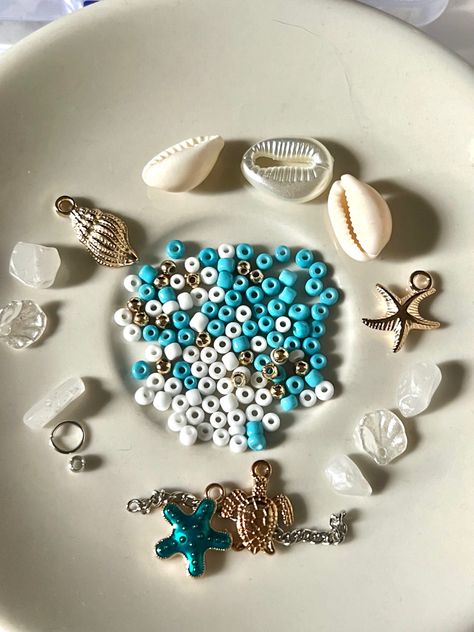 Beautiful blue and white beads, mama Mia inspired jewelry, ocean/beach jewelry, summery charms Mama Mia Jewelry, Jewelry Ocean, Urban Jewelry, Mama Mia, Handmade Beaded Jewelry, Inspired Jewelry, White Beads, Beach Jewelry, Ocean Beach