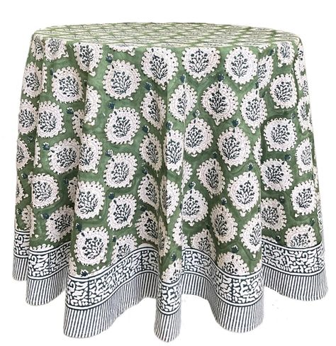 PRICES MAY VARY. MATERIAL - 100% COTTON : Our 'Kari Green' tablecloth is made of 100% power loom fabric which gives the fabric a strong, tighter & smooth weave. The fabric is superior grade with neatly finished stitched hems. SIZE - 90 Inches Round Tablecloth QUALITY CRAFTSMANSHIP : Our Kari Green table cloth floral design is inspired by the French Provencal Art. It is handmade using wooden blocks & printed by hand. Each table cloth is a a work of art and serves as a dining kitchen table cover a 90 Inch Round Tablecloth, Floral Table Cloth, Green Tablescape, Boho Tablecloth, Fall Tablecloth, Home Table Decor, Green Tablecloth, Floral Table, Wedding Linens