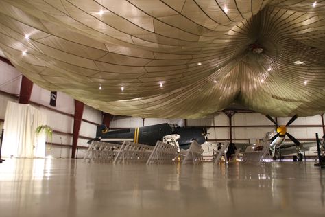 Parachute set up for wedding at Cavanaugh Flight Museum in Addison, Texas just… Addison Texas, Wedding Ceiling, Unique Wedding Venue, P 51 Mustang, P51 Mustang, Gala Events, Unique Wedding Venues, Wedding Photoshoot, Unique Wedding