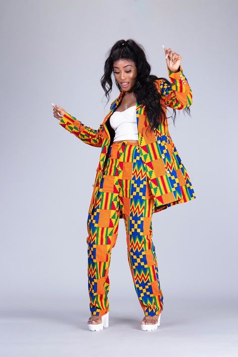 You know we are always thinking about ways to make our designs versatile. So here we go again with this suit that will give you ultimate value for your money. Wear this as a suit or wear the blazer alone as a duster or even a blazer dress. Made with 100% African wax cotton Models are 5’7” tall and wearing UK sizes 10 and 12 Care instruction: Wash with mild soap, do not bleach. Ankara Suit, African Clothing Stores, African Print Pants, Ankara Jackets, Costume Africain, To Start A Conversation, African Print Clothing, African Wedding Dress, 2 Piece Suit