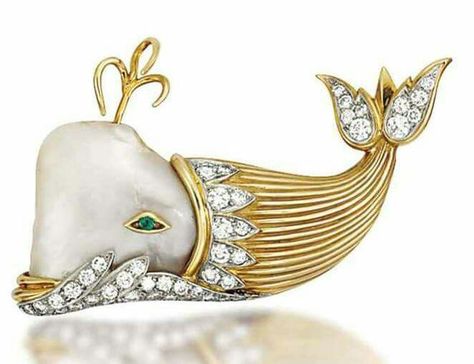 A PEARL AND DIAMOND NOVELTY BROOCH Modelled as a whale, the blister pearl head with emerald single-stone eye, to the reeded body and pavé-set brilliant-cut diamond tail,  Ca. 1960,  4.9cm long Sea Life Jewelry, A Whale, Animal Brooch, Enamel Necklaces, Diamond Brooch, Fabulous Jewelry, Gorgeous Jewelry, Animal Jewelry, Modern Jewelry