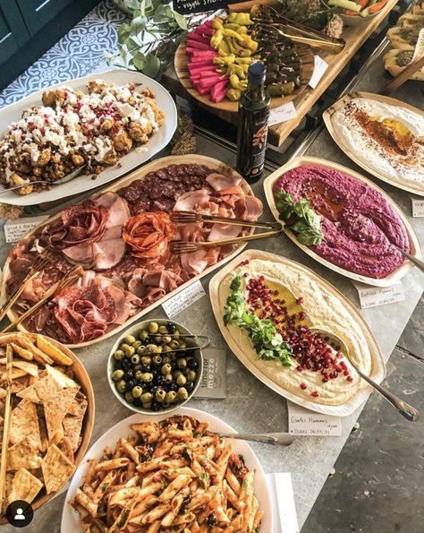 A beautiful mezze spread consisting of a variety of vegan and vegetarian dips, cured meats, roasted cauliflower, olives, pickles, salads and breads. Available to book throughout Lancashire and beyond! www.timeformezze.co.uk Mediterranean Buffet Ideas, Vegetarian Buffet Ideas, Mezze Buffet, Lebanese Catering, Mezze Platter Ideas, Snack Table Ideas, Mezze Table, Mediterranean Buffet, Lebanese Mezze