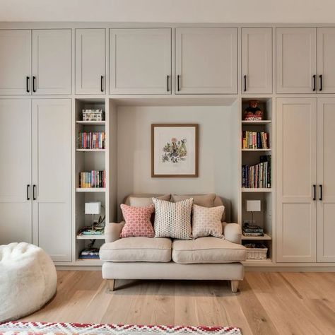 Sarah Fox on Instagram: "A brief to maximise storage in this little girls bedroom which we've achieved by building a wall of storage while also creating a snug reading nook. We've painted the walls & joinery a timeless grey/white Ammonite @farrowandball with an unexpected pop of pink, Rangwali, as you open the wardrobe doors 💖 . . . . . . . . #wardrobe #bespokewardrobes #bedroominspo #bedroomdecor #bedroom #girlsbedroom #girlsbedroomdecor #bookcasestyling #bookcase #readingnook #interiorinspo # Wall Of Storage, Building A Wall, Doors Wardrobe, Bespoke Wardrobe, Build A Wall, Bookcase Styling, Bedroom Wardrobe, Wardrobe Doors, Built In Wardrobe