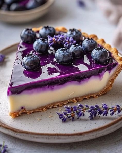 Blueberry Lavender White Chocolate Tart Indulge in this elegant tart featuring a luscious white chocolate ganache infused with a fragrant blueberry reduction and subtle hints of gourmet lavender paste. Nestled in a buttery graham cracker crust, this dessert is as stunning as it is delicious—perfect for any special occasion! Ingredients For the Graham Cracker Crust: - 4.5 oz graham crackers 🍪 - 6 tbsp unsalted butter, melted 🧈 - 3 tbsp granulated sugar 🍚 For the Blueberry Lavender White Cho... Blueberry Reduction, White Chocolate Tart, Blueberry Lavender, White Chocolate Ganache, Cracker Crust, Fruit Tart, Chocolate Tart, Graham Cracker Crust, Graham Cracker