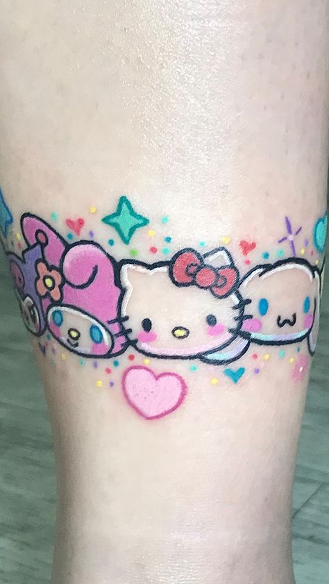 Sanrio bracelet. Can you name all these characters? #sanrio #sanriocore #sanriotattoo #hellokitty #hellokittylover #hellokittycore… | Instagram Hello Kitty And Friends Tattoo Ideas, Cute Sanrio Tattoos, Sanrio Sleeve Tattoo, Hello Kitty And Friends Tattoo, Hello Kitty Sleeve Tattoos, Tatuajes Hello Kitty Tattoos, Sanrio Tattoo Small, Sanrio Tattoo Ideas, Sanrio Bracelet