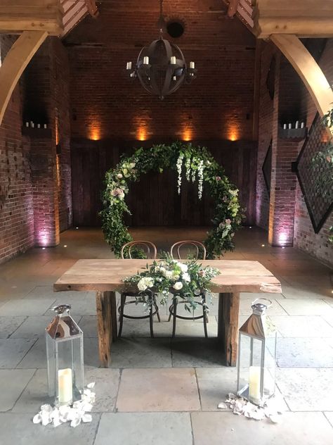 Registrar Table Decoration, Registrar Table Flowers, Wedding Moongate, Top Table White Flowers, Marquee Entrance Flowers, Wedding Band Stage Florals, Floral Moongate, Hanging Marquee Flowers, Arch Pics