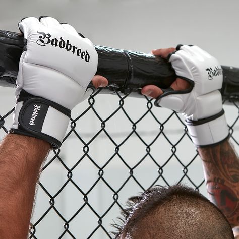 Badbreed Legion MMA Gloves: 4oz competition MMA glove with additional padded thumb. 1 inch of blow absorbing foam to protect the curvature of the knuckles. Velcro wrap around wrist strap with three adjustable sections, for a precise fit and further support to minimise injuries. Made from premium synthetic leather. Mma Gloves Drawing, Mma Gloves Tattoo, Karate Gloves, Muay Thai Gloves, Mma Equipment, Mma Gloves, Grappling, Mixed Martial Arts, Muay Thai