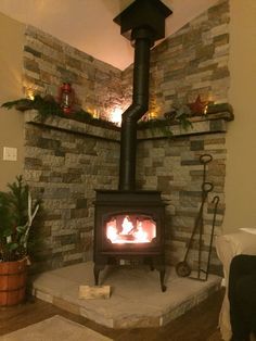 1000+ ideas about Wood Stove Hearth on Pinterest | Wood Stoves ... Tile Behind Pellet Stove, Wood Stove Corner Ideas, Woodstove Mantle, Wood Burning Stove Decor, Wood Stove Decor, Wood Burning Stove Corner, Corner Wood Stove, Wood Stove Surround, Stove Hearth