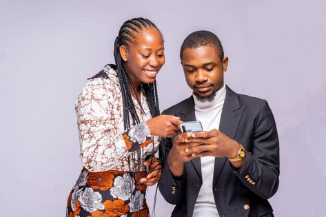 Photo man showing woman his phone.image ... | Premium Photo #Freepik #photo #dating #couple-dating #couple-smile #couple African Couple, White Studio Background, Photoshop Video Tutorials, Couples Poster, Geometric Pattern Background, Photoshop Video, Church Graphic Design, Wedding Photography Tips, Black Person