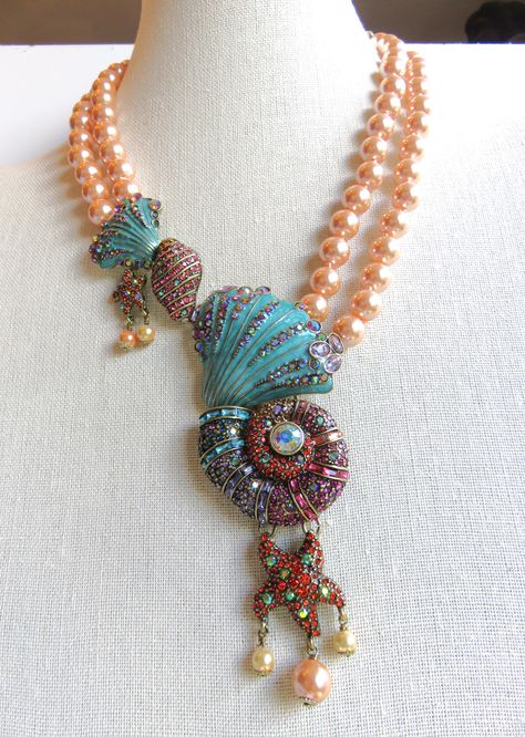 Stunning, Never Worn Heidi Daus "Down By The Sea" Beaded necklace. Measures 16 3/4" L with a 3 3/4" Extender. The drop measures 6" L X 4 1/2" W.  Peach colored  simulated glass beading with a hook closure. Mint condition, Signed Heidi Daus. Sea Necklace, Heidi Daus, By The Sea, Wire Jewelry, Mint Condition, Sea Shells, The Sea, Necklace Etsy, Jewelry Necklace Pendant