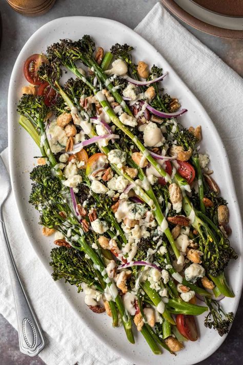 Roasted broccolini salad is a simple and healthy side dish to enjoy year-round. Whether roasted in the oven or air fryer, crisp-tender broccolini pairs well with a variety of fresh vegetables, cheeses and salad dressings. This recipe is vegan, gluten-free, and features crispy roasted cannellini beans. Brocolini Recipes Salad, Brocolini Recipes Roasted, Recipes With Broccolini, Brocollini Recipes Roasted, Grilled Broccolini Recipe, Brocolini Recipes Oven, Brocollini Salad, Air Fryer Brocollini, Broccolini Recipe Side Dishes