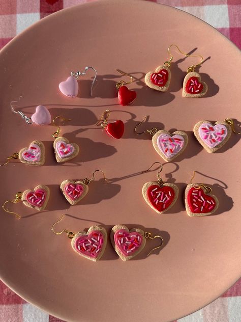 ❤️Celebrate love with these delightful Valentine's Day sugar cookie and macaron earrings!  💕Handcrafted with love, these sweet treats add a touch of whimsy to your style. Each pair is a unique, wearable work of art, perfect for expressing your affection. Treat yourself or a loved one to these charming accessories that capture the spirit of Valentine's Day. 💗Each pair was created using polymer clay and Hypoallergenic 925 Sterling Silver Plated 18K Gold or 925 Sterling Silver ear hooks ‼️This listing is NOT for the smaller version of the sugar cookie earring! Those are currently only available in the Mommy and Me bundle Unique Polymer Clay Earrings, Macaron Earrings, Valentines Day Sugar Cookies, Baked Clay, Pink Cookies, Bowling Green Ky, Baking Clay, Kawaii Earrings, Handmade Earring