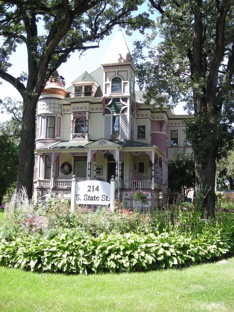 1889 Ora Pelton House in Elgin, Illinois (PHOTOS) - Pricey Pads Elgin Illinois, Three Story House, Porch Columns, Bold Color Schemes, State Street, Victorian House, Historic Places, Creative Lighting, Story House