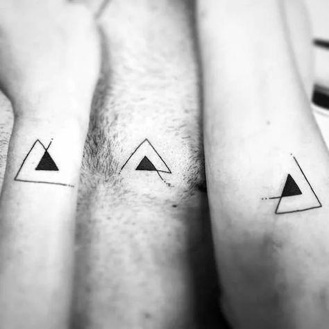 79 Sibling Tattoos To Get With Brothers And Sisters Triangle Sibling Tattoos For 3, Sibling Triangle Tattoo, Christian Sibling Tattoos, Sibling Tattoos Minimalist, Gender Neutral Sibling Tattoos, Three Sibling Tattoos Simple, Triple Tattoo Friends, Sibling Tattoos For Two, Unique Sibling Tattoos For 3