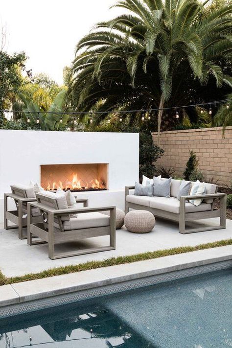 Beautiful backyard patio, swimming pool, outdoor seating area, and fireplace - patio ideas - backyard - outdoor fireplace - fire pit - outdoor furniture Fireplace Patio, Pure Salt Interiors, Outdoor Fireplace Designs, Pure Salt, Backyard Fireplace, Balkon Design, Ideas Backyard, Patio Interior, Backyard Inspo