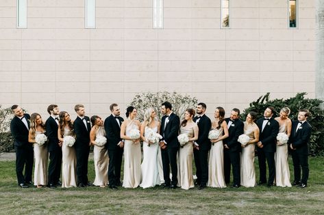 Neutral Mismatched Bridesmaids Dresses and Groomsman Black Tuxedo Suit with Black Bowtie Bridal Wedding Inspiration Champagne Bridesmaid Dresses Black Tuxes, Black And Champagne Bridesmaid Dresses, Gold Satin Bridesmaid Dresses, Neutral Wedding Party, Glam Bridesmaid Dresses, Bridesmaid Color Scheme, Mismatched Bridesmaids Dresses, Cream Bridesmaid Dresses, Black Tuxedo Suit