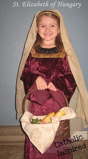 Hannah is St Elizabeth of Hungary. And she's just happy the dress is comfortable! ;-)  She's wearing a simple velvet robe with a decorative ... Saint Elizabeth Of Hungary Costume, Diy Veil, St Elizabeth Of Hungary, Saint Elizabeth Of Hungary, Elizabeth Of Hungary, Saint Costume, Veil Tiara, Kid Costume, Easter Play