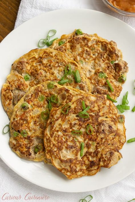 Tortang Giniling is a Filipino ground beef omelette. It is unique in that the omelette is made more like a fritter and is filled with lots of beef and veggies. It is a delicious recipe for breakfast or for a light lunch or snack.  | www.CuriousCuisiniere.com Tuna Omelette Filipino, Filipino Lunch Baon, Ground Beef Omelette, Tortang Giniling Recipe, Tortang Talong With Ground Beef, Filipino Ground Beef Recipes, Beef Filipino Recipe, Ground Beef Filipino Recipe, Filipino Breakfast Ideas