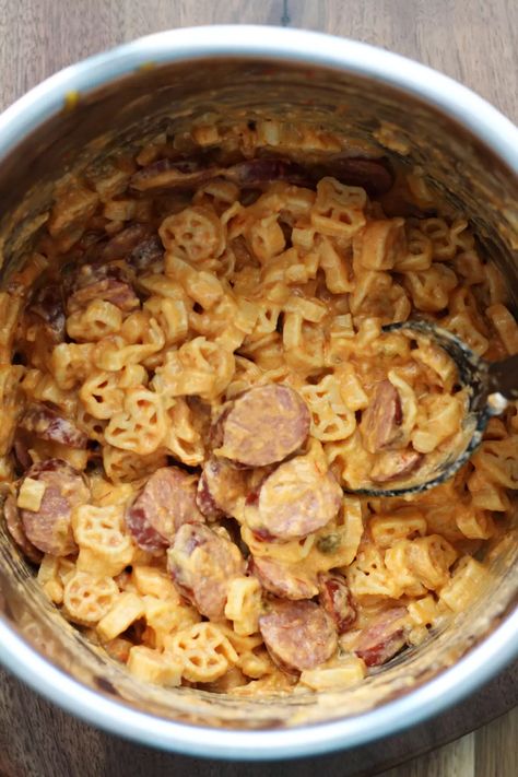 Quarterback Casserole--smoked sausage, wagon wheel pasta with salsa and cheese. An easy Instant Pot recipe you can count on. Instant Pot Rigatoni And Sausage, Andouille Sausage Pasta Instant Pot, Instant Pot Sausage Pasta, Instant Pot Pasta With Sausage, Cajun Sausage Pasta Instant Pot, Wagon Wheel Pasta, Pasta Instant Pot, Cajun Sausage Pasta, Cajun Sausage