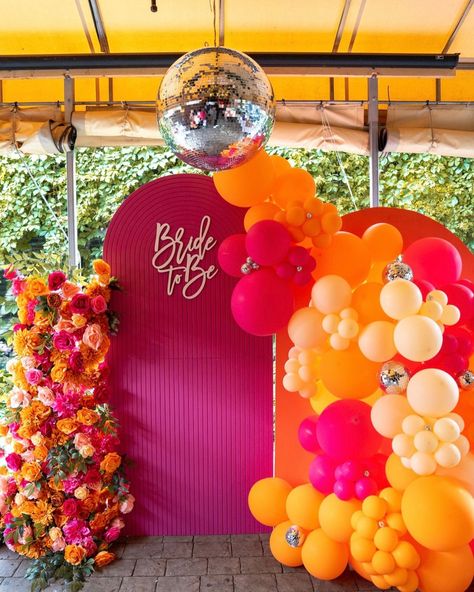 It was love at first Spritz 🥂🍾🍊 Over the weekend we showed our beautiful friend @melb015 👰🏻 We designed everything from the flower displays to the table setup, & centerpieces, the dessert displays and balloons with the backdrops of course! 🎈 We love the bright colors and how fun this set up was! Thank you for allowing us to bring your vision to life @melb015 💕💕 Book your bridal shower with us today! 💕 📸 @biacco_ Sunset Bridal Shower Theme, Love In Bloom Bridal Shower Backdrop, Bridal Shower Pink And Orange, Love At First Spritz, Flower Displays, Bridal Shower Backdrop, Shower Diy, Pink Bridal Shower, Dessert Display