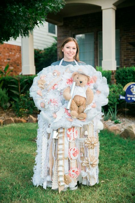 HUGE football Homecoming mum. Bigger in Texas!   Burlap and coral. Made.by ACTS… Huge Homecoming Mums, Texas Homecoming Mums Braid Tutorials, Texas Hoco Mum, Texas Braid Mum, Garder Mum Homecoming, Homecoming Mums Senior, Football Homecoming, Texas Homecoming Mums, Mums The Word