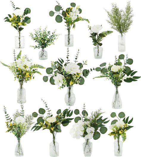 PRICES MAY VARY. 【𝐑�𝐢𝐜𝐡 𝐃𝐈𝐘 𝐜𝐨𝐦𝐛𝐢𝐧𝐚𝐭𝐢𝐨𝐧𝐬】Equivalent to 12 sets of artistic flowers with vase，it including 106 bulk fake plants & 12 glass bud vases(118-Psc). The types of fake plants include: eucalyptus, Christmas branches, babys breath, hyacinths, white flowers, Bulgarian roses, maple leaves, etc. 【𝐇𝐢𝐠𝐡-𝐪𝐮𝐚𝐥𝐢𝐭𝐲 𝐯𝐚𝐬𝐞𝐬】There are 12 high-quality glass bud vases in each combination, with sizes ranging from 3 to 7 inches. The raw material is made of quartz sand and Artificial Flower Centerpieces, Vases Centerpieces, Central Table, Plant Bud, Christmas Branches, Greenery Centerpiece, Willow Leaf, Diy Set, Vase Centerpieces