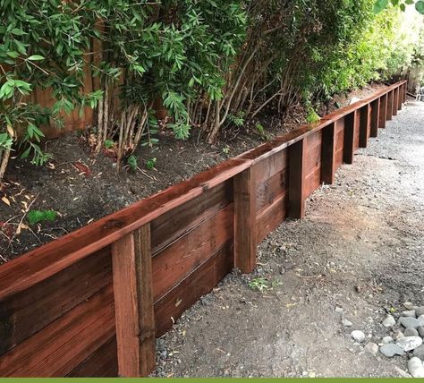 Cedar Retaining Wall, Wood Raised Flower Beds, Wood Retaining Wall Garden, Front Porch Decking Ideas, Wood Garden Retaining Wall, Planter Bed Retaining Wall, Wood Retaining Wall Driveway, Log Retaining Wall Garden, Treated Pine Retaining Wall