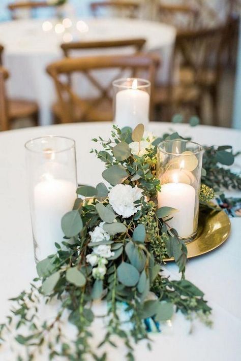 greenery seeded eucalyptus and candle wedding centerpiece ideas  #weddings #wedding #weddingcolors #weddingideas #greenweddings #weddingcenterpieces Eucalyptus Wedding Decor, Romantic Centerpieces, Greenery Wedding Centerpieces, Romantic Wedding Centerpieces, Wedding Candles Table, Greenery Wedding Bouquet, Greenery Wedding Decor, Elegant Wedding Centerpiece, Simple Wedding Centerpieces