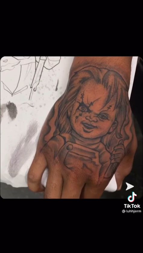 Chunky Hand Tattoo, Ape Hand Tattoo, Hood Tattoo For Men Hand, Hand Tattoos Men Black, Chucky Tattoo Hand, Side Thumb Tattoos, Hand Face Tattoos, Scary Hand Tattoos, Color Hand Tattoos